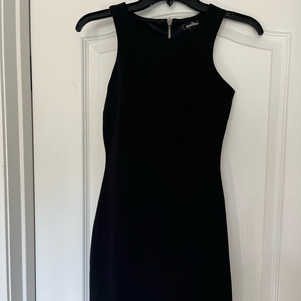 Black dress, comes above the knee. Size 1!